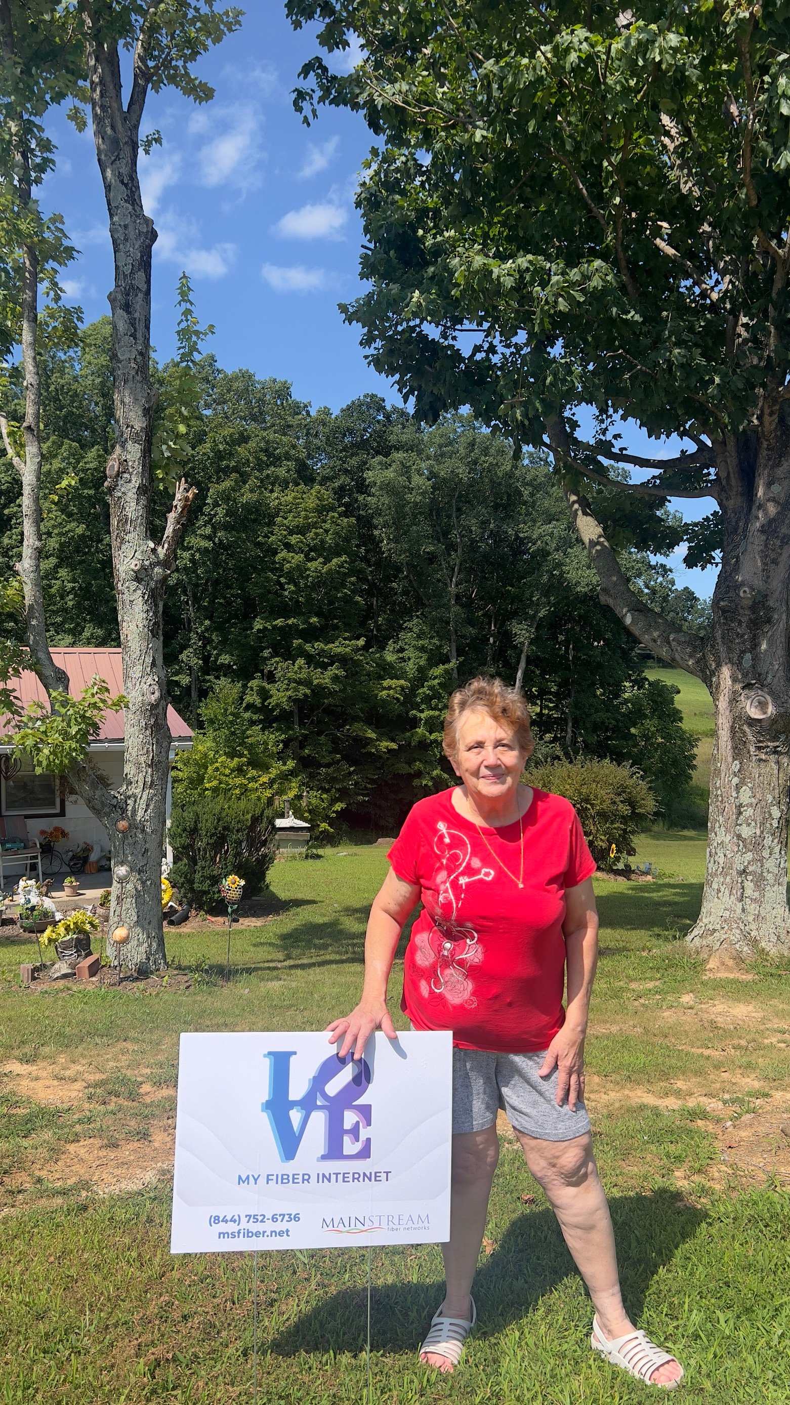 Local fiber internet subscribers standing by Love My Fiber sign